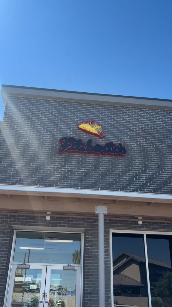 Filiberto's restaurant storefront in Tempe, Arizona, with its taco logo sign.